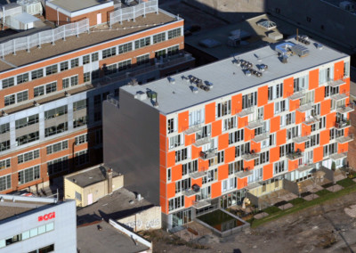 M9 Phase I, tour à condos, 2 étages de stationnement sous-terrain, 7 étages résidentiels, 79 000 Pc, 60 unités, Montréal.